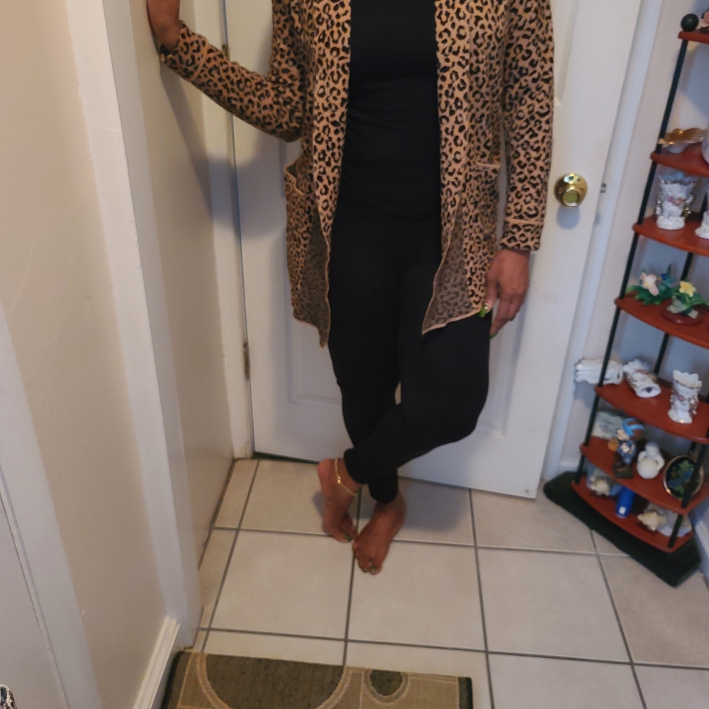 Cynthia Rowley Leopard Print Cardigan. Can fìt up to a large as a lot of Streach